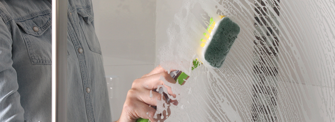 A Genius Shower Cleaning Hack: A Dish Brush